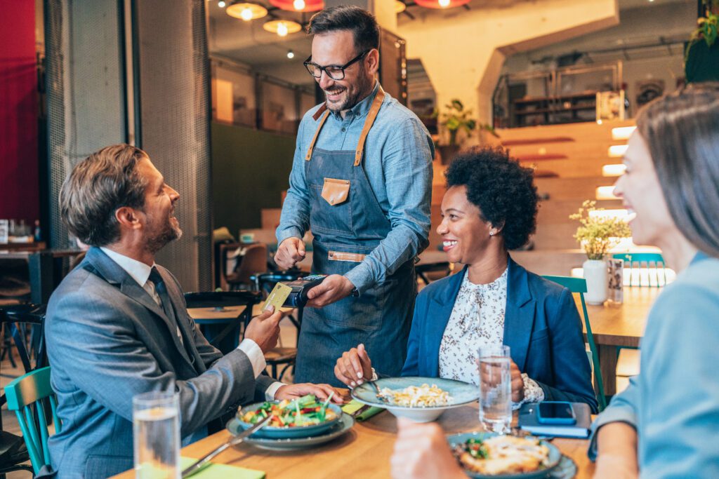 Businessman paying with credit card